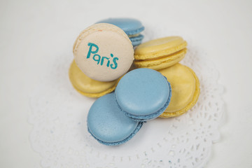 sweet french macaroon on white isolated white background. fly falling sweet macaroni