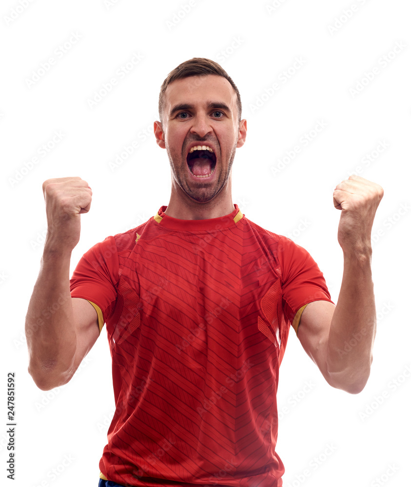 Wall mural Athlete / fan on red uniform celebrating on white background