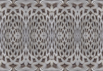 White, grey, brown ornate design on burlap background