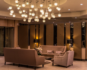 Idea for modern luxurious lobby for prestige establishment with comfortable sofas, arm chairs and...