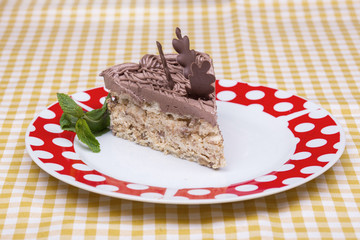 Piece of chocolate cake with warm fudge sauce.
