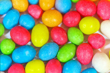 Fototapeta na wymiar Close up of a assorted jelly beans. Colorful sweet candy background. Shallow depth of field