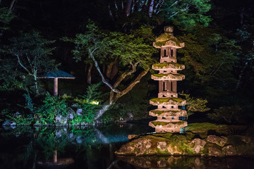 Traditional lantern at night in Kenroku-en garden in Kanazawa, Japan