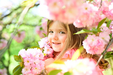 Fototapeta premium Summer girl fashion. Happy childhood. Little girl in sunny spring. Small child. Natural beauty. Childrens day. Springtime. weather forecast. face and skincare. allergy to flowers. I am free