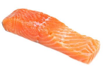 Red fish. Raw salmon fillet isolate on white background.