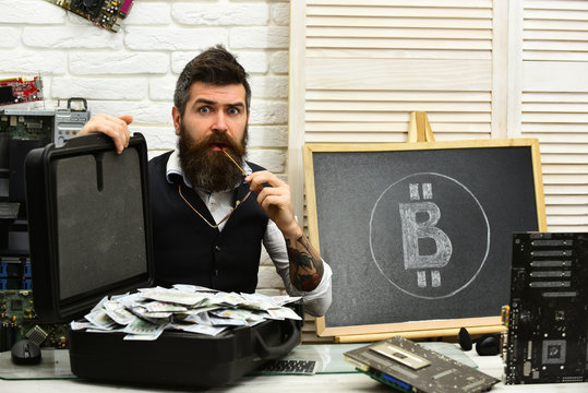 It exceeded all expectations. Bearded man with cash money. Bearded hipster with bitcoin symbol and dollars. Business man in server room. Bitcoin for business. From paper money to crypto currency