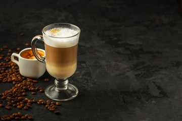 coffee freshly brewed in a white cup serving of beverage (coffee grain). food. top.copy save