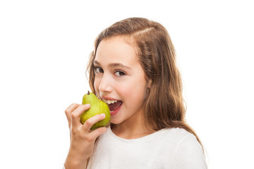 Young girl eating fruit isolated on white background