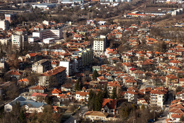 Fototapeta na wymiar OVECH, BULGARIA -15 January 2019: Spectacular aerial panorama of provincial town of Ovech, Provadia, Bulgaria, made from top of the rock of medieval fortress of Ovech. View overlooking town