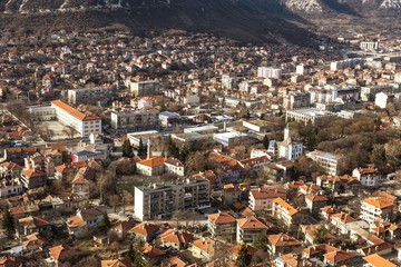 OVECH, BULGARIA -15 January 2019: Spectacular aerial panorama of provincial town of Ovech, Provadia, Bulgaria, made from top of the rock of medieval fortress of Ovech. View overlooking town