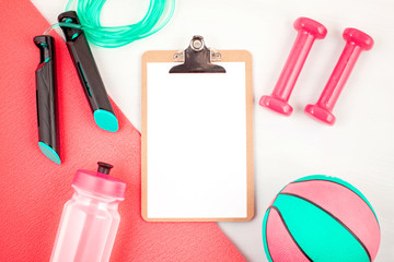 Flat lay of dumbbell, sport and fitness equipments