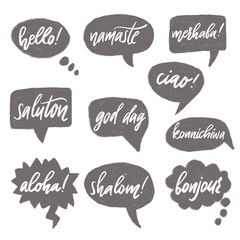 Colorful speech or thought bubbles of different shapes and sizes with greetings in different languages.Great for posters, comic strip and cartoon. © Vadim