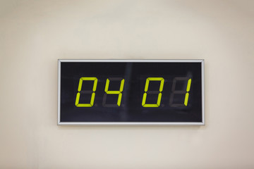 Black digital clock on a white background showing time 04.01 minutes