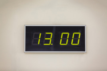 Black digital clock on a white background showing time 13.00 minutes