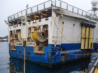 Seismic equipment on nautical ship explorer in port. Oil search industry