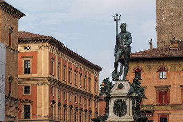 Fototapeta na wymiar Fountain of Neptune on Piazza Maggiore in Bologna, Italy