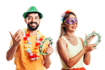 Brazilian Carnival. Couple in costume enjoying the carnival party on white background