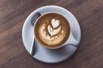 Cappuccino on a wooden table