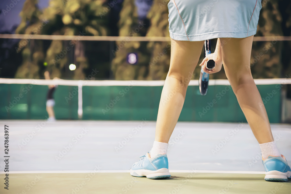 Wall mural tennis match which the opponent serving lady player - tennis sport game concept