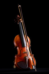 Fototapeta na wymiar retro violin on a black background