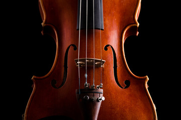 retro violin close-up on a black background