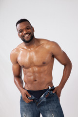 Fototapeta premium Happy Strong Black man with his shirt off