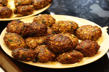 Minced meat patties, fried with spices and vegetables
