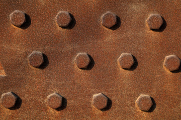 oxidized rusty steel plate and rivet