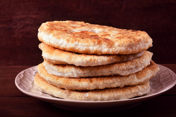 Flapjacks with meat on a plate. Fried in a pan.
