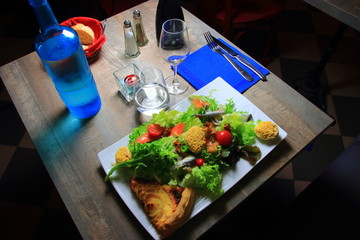 table of a French restaurant with glasses and flatware