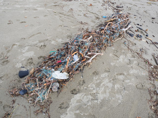 fishing net full of plastic waste. Symbol fo ocean pollution