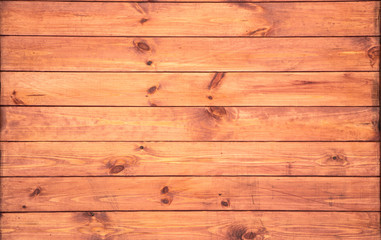 Naklejka premium closeup background of orange wood old texture
