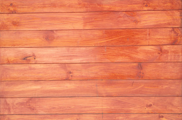 Naklejka premium closeup background of orange wood old texture