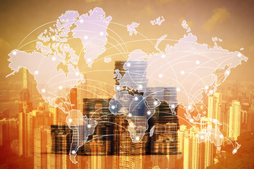 Double exposure of coin stack with city background and world map, financial graph, world map and...