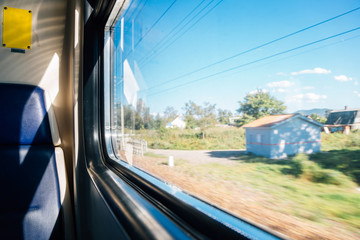 Countryside village by train window in Russia