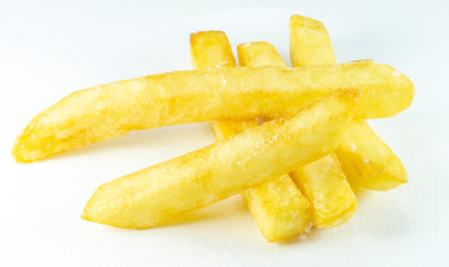 French Fries in a white dish on white background, Close up.