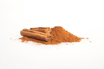 Cinnamon sticks and powder isolated on white background