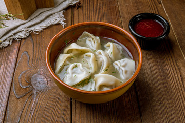 Dumplings with sour cream and herbs