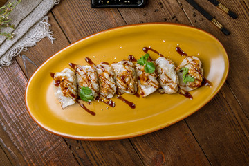 Fried Chinese gedza with soy sauce