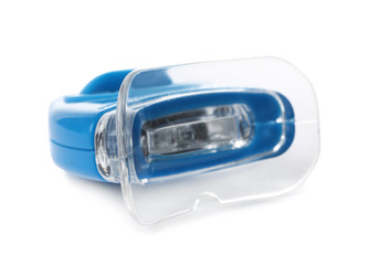 Tooth whitening device on white background. Dental care