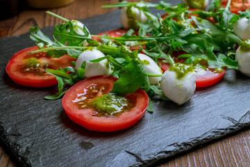 Caprese salad with mozzarella and tomato