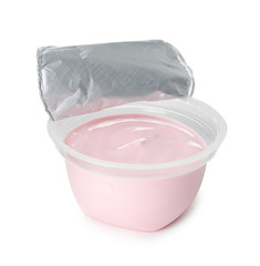Plastic cup with creamy yogurt on white background