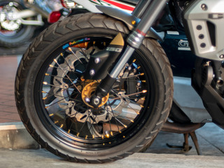 The rear wheel of Red motorcycle 