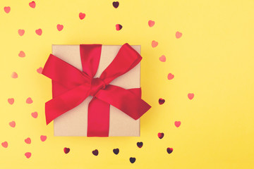 Gift or present box on yellow background