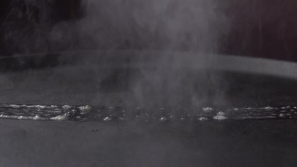 Cube of Butter Melting Sizzling Browning in Non Stick Pan Skillet in Slow Motion, Preparation for Cooking - 240 FPS