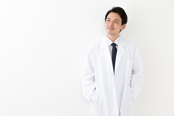portrait of young asian doctor isolated on white background