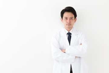 portrait of young asian doctor isolated on white background