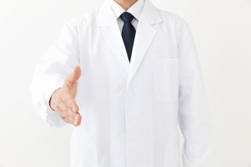portrait of young asian doctor isolated on white background