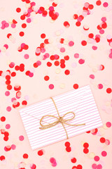 Envelope on pink background