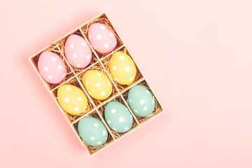 Easter eggs on pink background